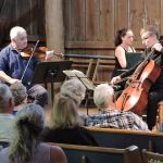 Violinst Stefan Hersh, from left, pianist Yana Reznik and cellist Alexander Hersh perform at the Iglitzin barn in Quilcene during a concert on Aug. 20. They were the first to perform there since 2015. &mdash; Concerts in the Barn.