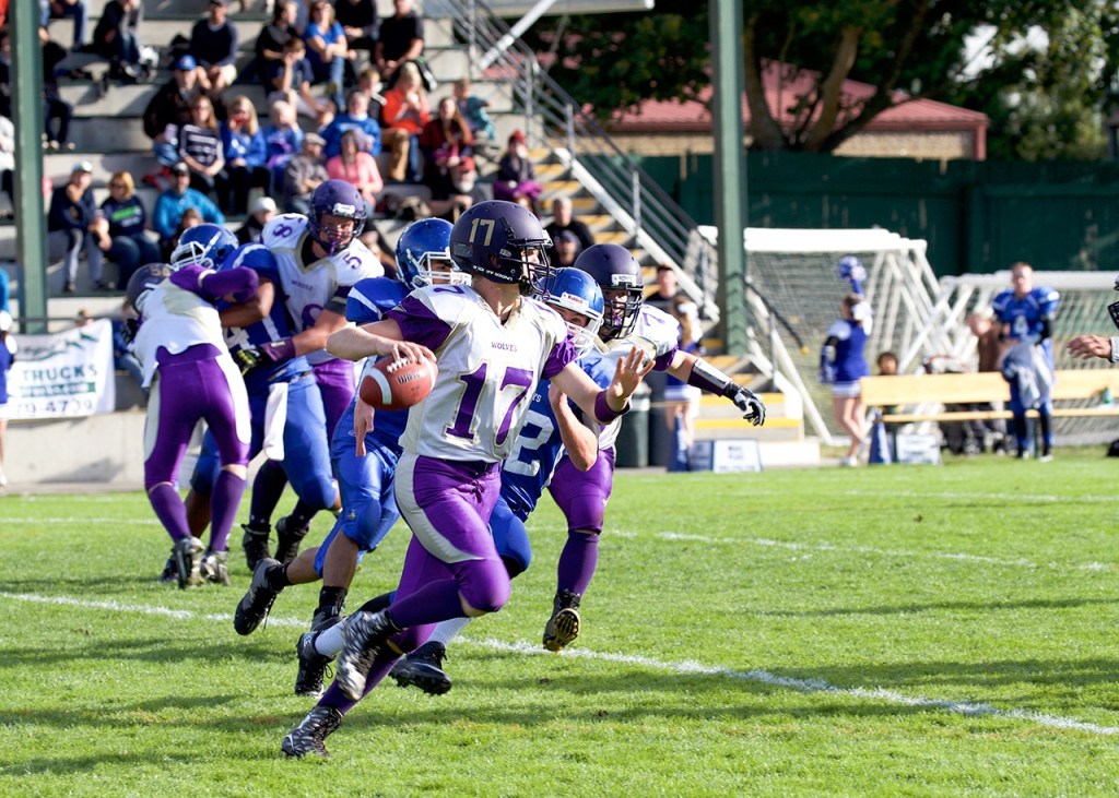 Steve Mullensky/for Peninsula Daily News Sequim quarterback Riley Cowan (17) returns after a successful freshman season under center for the Wolves. Cowan completed 55 of 95 passes for 849 yards, 9 touchdowns and 6 interceptions last year.