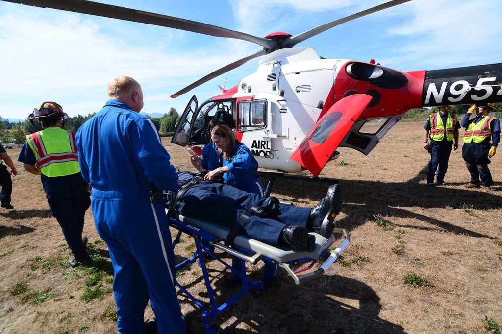 Airlift Northwest lands at Greywolf Elementary School after a mass shooting drill Friday. (Jesse Major/Peninsula Daily News)