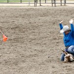 Dave Logan/for Peninsula Daily News Port Angeles&rsquo; Amelia Hermann, 12, completes her Junior Girls Goat Tying event in just over 12 seconds at the Peninsula Junior Rodeo Association&rsquo;s Junior Rodeo. Each participant rides their horse to a waiting goat in the middle of the arena, flips the goat over and ties three legs as fast as they can. More than 100 boys and girls up to age 18 participated in the two-day competition at the Clallam County Fairgrounds.