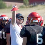 Steve Mullensky/for Peninsula Daily News                                New Port Townsend Redhawks head coach Alex Heilig instructs his players at a preseason practice.