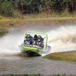 Keith Thorpe/Peninsula Daily News The Sequim-based Live Wire spint boat piloted by Paul Gahr, right, with Josh Gahr navigating makes its way around the course at the Extreme Sports Park in Port Angeles during racing in July.