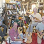 The Juan de Fuca Foundation of the Arts is seeking artists to paint old-stringed instruments to be auctioned off in January. From left are foundation board members Eric Neurath, Dan Maguire, Jennifer Bright, Clark Driese and Steve Gilchrist. (Juan de Fuca Foundation of the Arts)