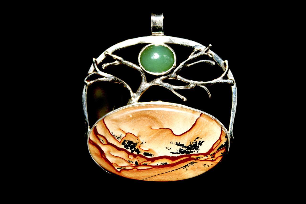 This piece of jewelry created by Michael Kenney, titled &ldquo;The Dawn Swan,&rdquo; will be on display during Gallery Walk at Gallery 9, 1012 Water St. &mdash; Michael Hale.