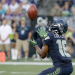 The Associated Press Seattle&rsquo;s Tyler Lockett brings in the ball during a kick return in a preseason game last month.
