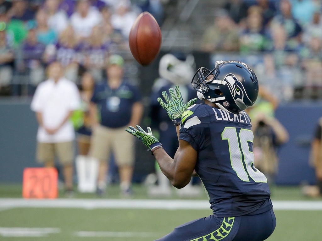 The Associated Press Seattle&rsquo;s Tyler Lockett brings in the ball during a kick return in a preseason game last month.