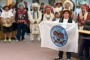 Lower Elwha tribal members stand with Standing Rock Sioux