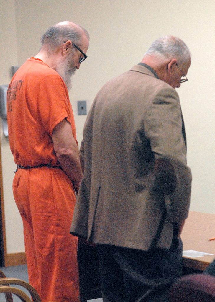 Douglas Allison, left, stands with public defender Harry Gasnick as Allison reads a statement to the court at his sentencing Wednesday. (Keith Thorpe/Peninsula Daily News)