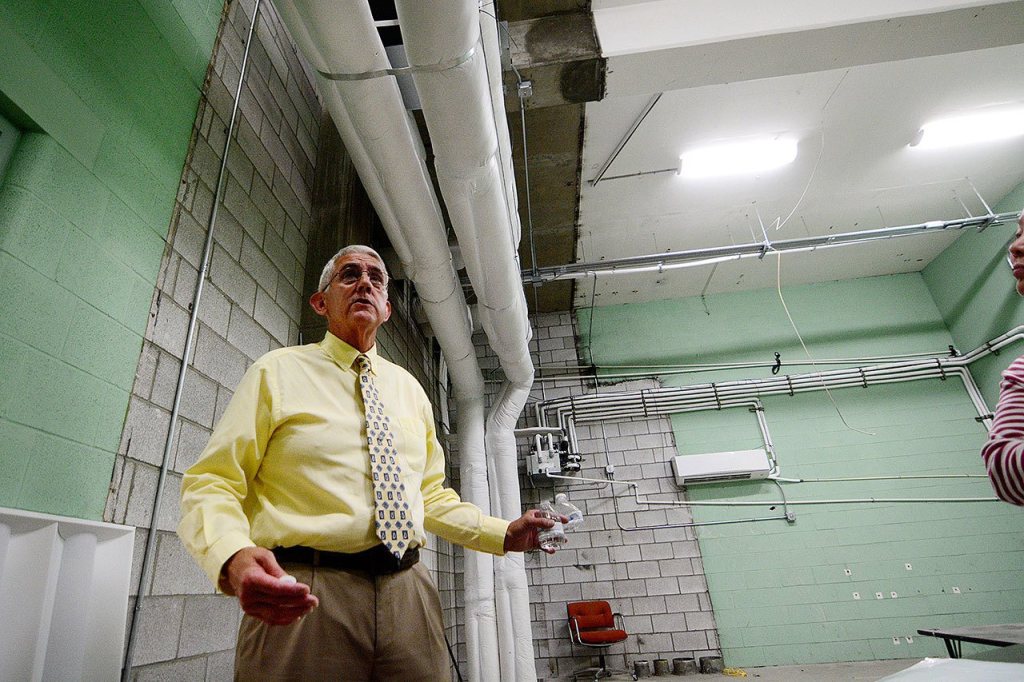 Lower Elwha Klallam Tribal CEO Michael Peters shows a room that will be remodeled into an office area in the tribe&rsquo;s justice center. (Jesse Major/Peninsula Daily News)