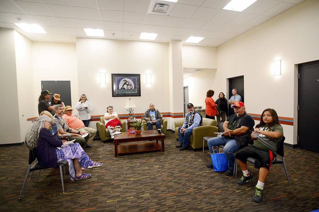 Guests relax and talk at the Lower Elwha Klallam tribe&rsquo;s new justice center Tuesday. (Jesse Major/Peninsula Daily News)
