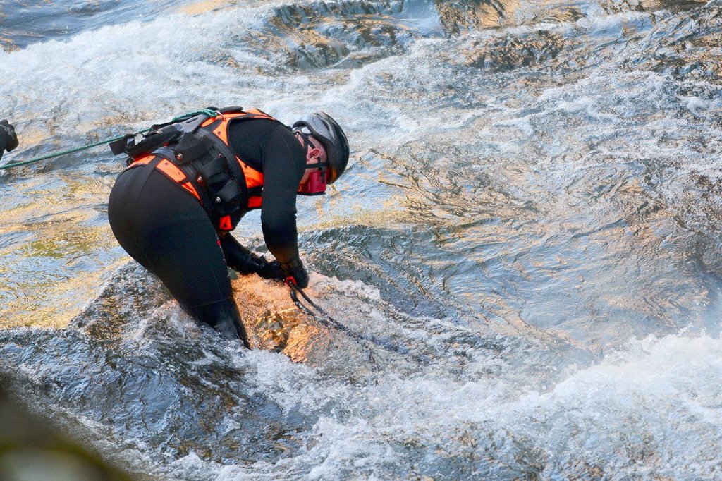 U.S. Army Corps of Engineers diver Lance Gullett used a welding torch to cut through rebar at the former Elwha Dam site Thursday. (Jesse Major/Peninsula Daily News)