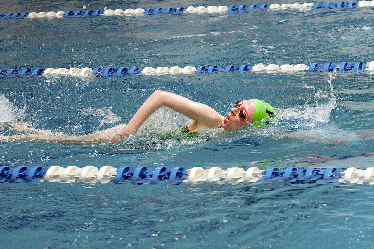 Patti Reifenstahl                                Port Angeles&rsquo; Janelle Stevenson swims freestyle in the 200-yard free relay against Klahowya.