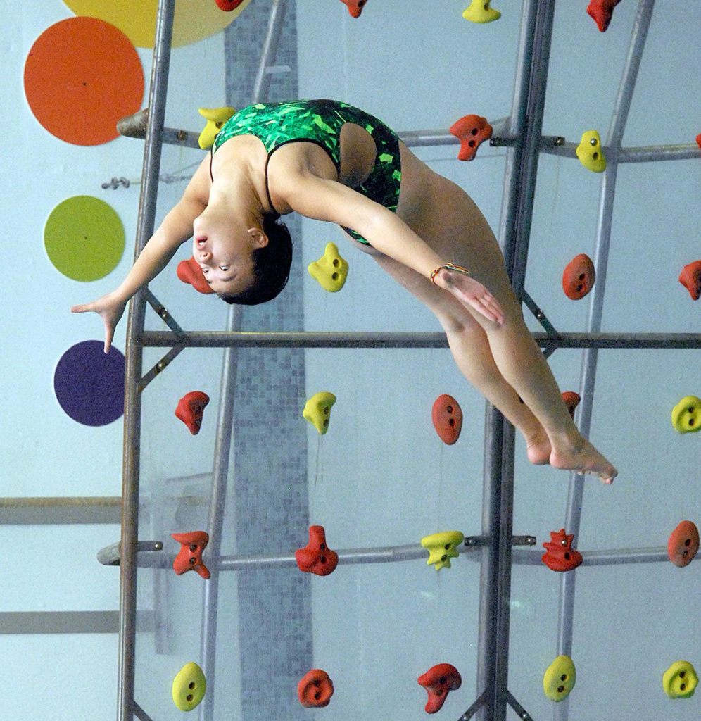 Keith Thorpe/Peninsula Daily News Lum Fu competes in the diving portion of Tuesday&rsquo;s meet against Peninsula High School on Tuesday at William Shore Pool in Port Angeles.