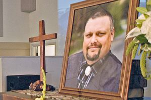 Logger, television star, father, coach remembered at service