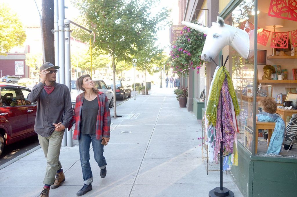 With the summer weather still here, downtown Port Townsend is still bustling with people. However, the city is already planning on how to market the town to keep businesses busy in the winter months. (Cydney McFarland/Peninsula Daily News)