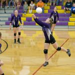 Steve Mullensky/for Peninsula Daily News Quilcene&rsquo;s McKenzie Kieffer (5), Emily Hitt (1) and Bailey Kieffer watch as Allison Jones hits a return during a game against the Chimacum Cowboys.