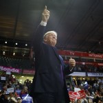 Republican presidential candidate Donald Trump arrives to a campaign rally at Xfinity Arena. (Evan Vucci/The Associated Press)