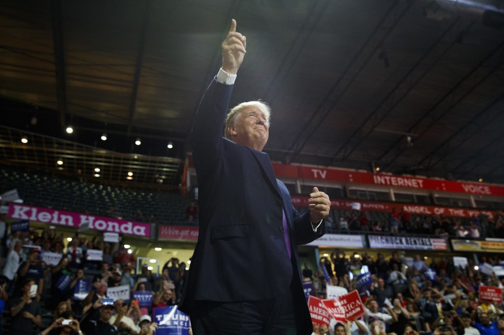 Republican presidential candidate Donald Trump arrives to a campaign rally at Xfinity Arena. (Evan Vucci/The Associated Press)