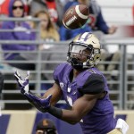 Washington&rsquo;s John Ross reaches for a 38-yard touchdown pass against Rutgers in the first half of an NCAA college football game Saturday, Sept. 3, 2016, in Seattle. (AP Photo/Elaine Thompson)