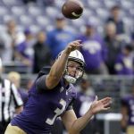 Washington quarterback Jake Browning passes against Rutgers in the first half of an NCAA college football game, Saturday, Sept. 3, 2016, in Seattle. (AP Photo/Elaine Thompson)