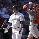 Seattle Mariners&rsquo; Chris Iannetta, left, flips his bat after striking out as Los Angeles Angels catcher Jett Bandy tosses the ball back to the mound in the seventh inning of a baseball game Sunday, Sept. 4, 2016, in Seattle. (AP Photo/Elaine Thompson)