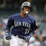 Seattle Mariners&rsquo; Robinson Cano blows a bubble as he rounds the bases on his two-run home run against the Texas Rangers during the first inning of a baseball game Monday, Sept. 5, 2016, in Seattle. (AP Photo/Elaine Thompson)