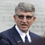 Randy Dorn, state Superintendent of Public Instruction, talks to reporters Wednesday in Olympia following a state Supreme Court hearing on the ongoing battle surrounding the state&rsquo;s constitutional requirement to properly fund basic education. (Ted S. Warren/The Associated Press)