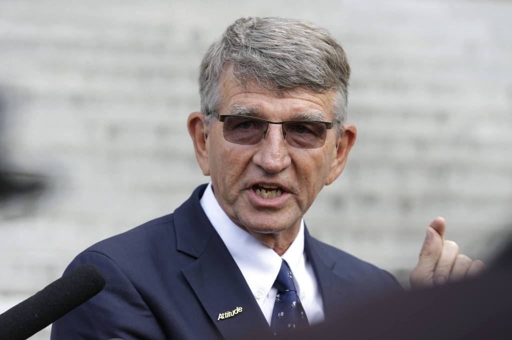 Randy Dorn, state Superintendent of Public Instruction, talks to reporters Wednesday in Olympia following a state Supreme Court hearing on the ongoing battle surrounding the state&rsquo;s constitutional requirement to properly fund basic education. (Ted S. Warren/The Associated Press)