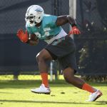FILE - In this Aug. 15, 2016 file photo, Miami Dolphins defensive end Mario Williams runs drills, during practice at NFL football training camp in Davie, Fla. Williams makes in his debut with Miami on Sunday, Sept. 11 when the Dolphins play the the Seattle Seahawks. (AP Photo/Lynne Sladky, File)