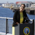 Maia Bellon, director of the state Department of Ecology, speaks at a news conference Thursday overlooking Elliott Bay in Seattle. (Ted S. Warren/The Associated Press)