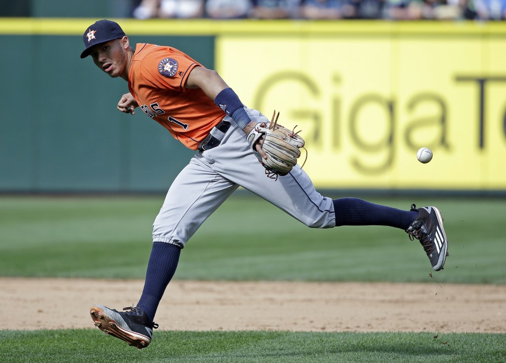 Seth Smith’s two HR, 4 RBI help Seattle beat Astros 7-3