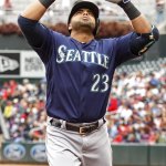 Seattle Mariners designated hitter Nelson Cruz celebrates his home run against the Minnesota Twins in the second inning of a baseball game Sunday, Sept. 25, 2016, in Minneapolis. (AP Photo/Bruce Kluckhohn)