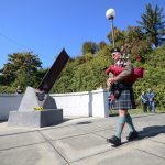 Rick McKenzie, a retired Coast Guard veteran, plays bagpipes at the 9/11 memorial at the Francis Street Park in Port Angeles on Sunday. (Jesse Major/Peninsula Daily News)
