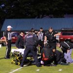 Bill Noard is cared for by emergency responders Saturday. (Michael Dashiell/Olympic Peninsula News Group)