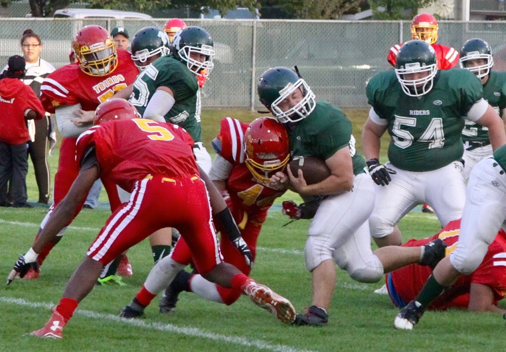Dave Logan/for Peninsula Daily News Port Angeles&rsquo; Jace Lausche is hit by Mount Tahoma&rsquo;s Sonny Te&rsquo;o. The hit forced a fumble which the Thunderbirds recovered.