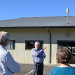 Sequim Public Works Director David Garlington discusses options for replacing the roof at the Guy Cole Convention Center on Sept. 12 during a tour for Sequim City councilors. Matthew Nash/Olympic Peninsula News Group