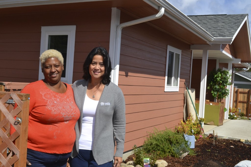 Matthew Nash/Olympic Peninsula News Group                                Cyndi Hueth, executive director of Habitat for Humanity of Clallam County, on right, says Eula Cook put in record time toward her home and other Habitat projects. New homeowners like Cook must put in at least 250 hours of &ldquo;sweat equity&rdquo; before receiving a 0-percent interest loan from Habitat.