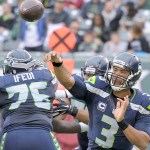 Wilson throws 3 TDs in Seahawks win