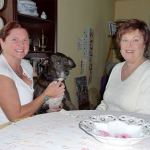 Michele Swisher, her mother&rsquo;s dog Perla and Judy Coram make plans for the day. (Patricia Morrison Coate/Olympic Peninsula News Group)