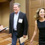 The Associated Press                                Democrat Hilary Franz, right, and Republican Steve McLaughlin, center, laugh Sept. 14 after McLaughlin won a coin toss made by Jason Hagey, left, vice president of Communications for the Association of Washington Business, before the two debated at the AWB Policy Summit in Cle Elum.