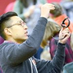 Jon Nadiranto, of Sqord, helps fifth-grade students in Port Angeles with their new Sqord devices on Monday. (Jesse Major/Peninsula Daily News)