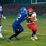 Steve Mullensky/for Peninsula Daily News                                Port Townsend&rsquo;s Kyle Blankenship, right, fights off Chimacum&rsquo;s Logan Storm during the Redhawks&rsquo; victory earlier this month. Port Townsend hosts Klahowya tonight in a crucial Olympic-Nisqually League game.
