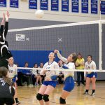 Steve Mullensky/for Peninsula Daily News                                Chimacum&rsquo;s Taylor Cartum (7) watches as teammate Kaitlyn Ejde (11) jumps up to block a shot by Crescent&rsquo;s Hannah Lee as teammates Alyssa Hutto (11) and Ashara Dodson (15) back up the play, during volleyball action on Monday in Chimacum.
