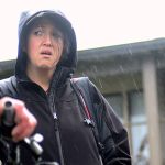 Viola Ware, program director of coordinated intake for Serenity House, lets people on the Olympic Discovery Trail know about resources Serenity House provides, including its shelter. (Jesse Major/Peninsula Daily News)