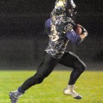 Keith Thorpe/Peninsula Daily News                                Sequim&rsquo;s Gavin Velarde spints across field on his way to the end zone in the third quarter.