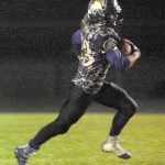 Keith Thorpe/Peninsula Daily News                                Sequim&rsquo;s Gavin Velarde spints across the field on his way to the end zone in the third quarter.