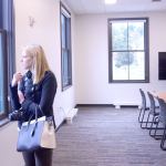 Laura Walters of Pease Construction tours the new Peninsula College facility at Fort Worden State Park in Port Townsend. (Cydney McFarland/Peninsula Daily News)
