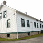 The two-story Building 305 at Fort Worden is expected to be the focal point of the arts and cultural hub of Makers Square once it is remodeled. (Cydney McFarland/Peninsula Daily News)
