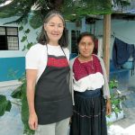 Linda Finch &mdash; Mujeres de Maiz Opportunity Foundation of Clallam County board member, at left &mdash; is seen here with Antonia, who has been on scholarship for several years and made Linda&rsquo;s apron. (Judith Pasco)                                Linda Finch, Mujeres de Maiz Opportunity Foundation of Clallam County board member, is seen with Antonia, who has been on scholarship for several years and made Linda&rsquo;s apron. (Judith Pasco)