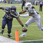 Wilson throws 3 TDs in Seahawks win